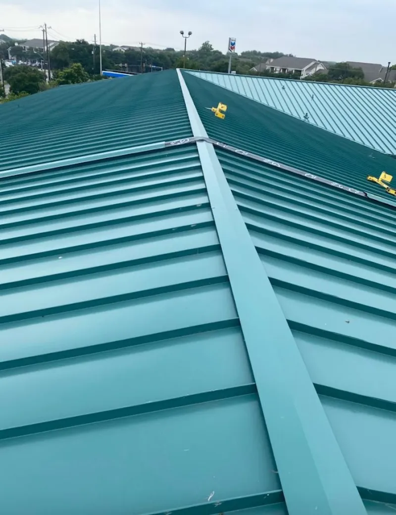 Green commercial metal roof ridge and valley for Metal Roof Repair in El Reno