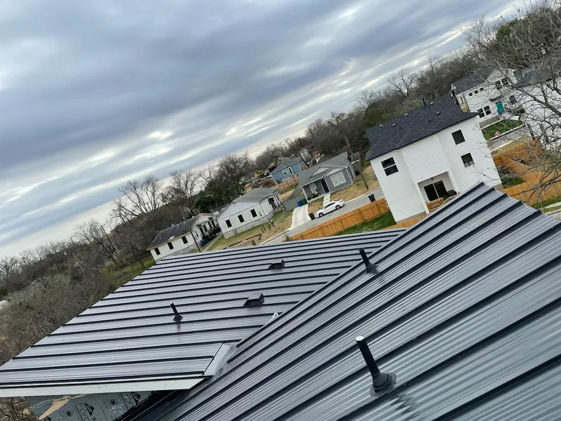 Standing seam metal roof panels with vents for Skylight Repair in El Reno